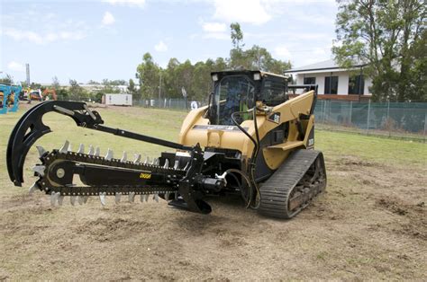 skid steer with trencher|trenching attachment for skid steer.